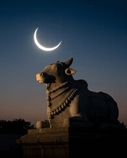 Spiritual statue under moonlight